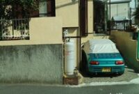 1762341922516-ilustrasi-parkir-mobil-di-jepang_43