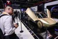 1762493035020-tesla-pamerkan-cybercab-di-china-international-import-expo-2025-shanghai-1762434313788_43