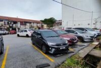 1765796693714-parkir-kendaraan-di-penang-malaysia-1_43