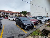 1765796693714-parkir-kendaraan-di-penang-malaysia-1_43
