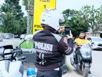 1769058292305-ilustrasi-tilang-sistem-electronic-traffic-law-enforcement-etle-handheld-di-kabupaten-bandung-1768640309543_43